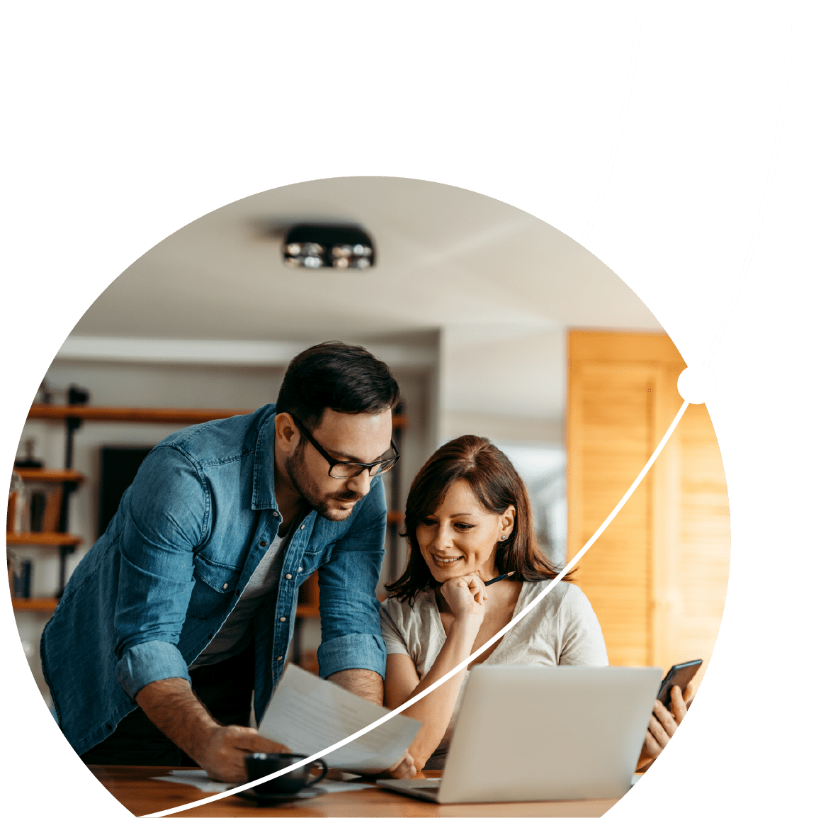 A couple reviewing finances on a computer