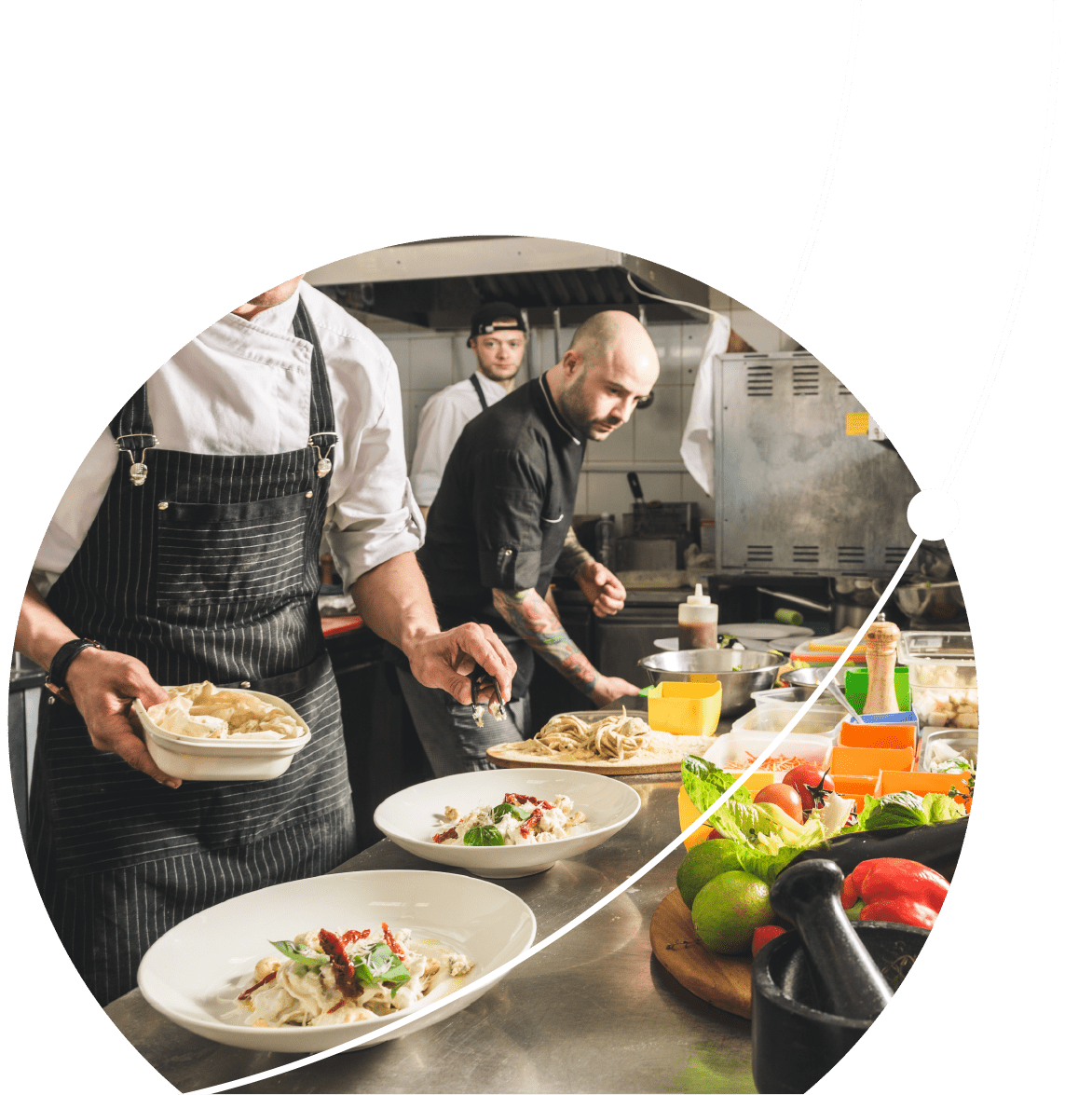 Chefs working in the back house of a restaurant