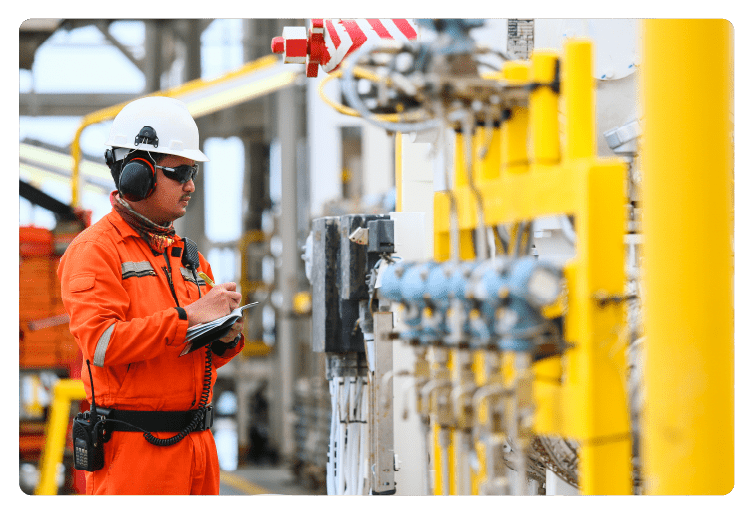 operator recording operation of oil and gas process at oil and rig plant, offshore oil and gas industry, offshore oil and rig in the sea, operator monitor production process, routine daily record.